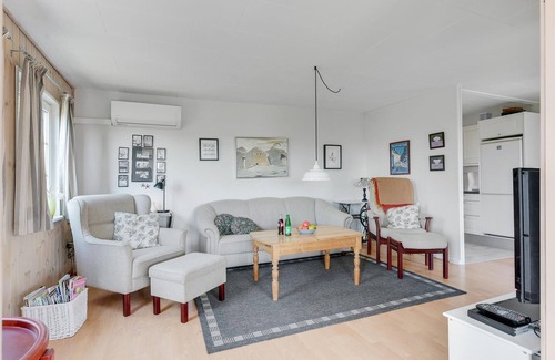 Aabenraa House | Cozy cottage with panoramic view from the living room and terrace.