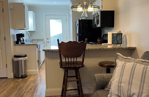 Navarre House | Cozy cottage with private shaded patio and grilling area. Perfect Retreat!