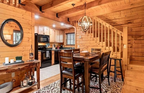 Maggie Valley Cabin | Cozy creek side cabin with fireplace, close to skiing/hiking, and shops.
