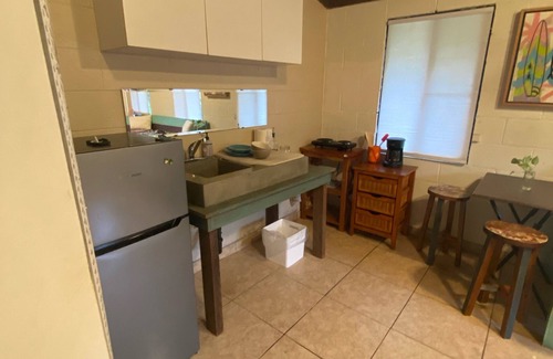 Haleiwa House | Cozy downstairs Apartment located one block from beach in V-land.