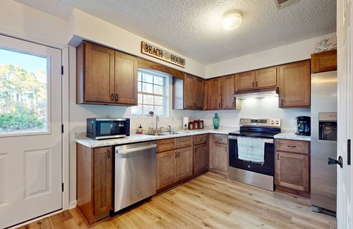 Surf Side Shores House | Cozy home with sunroom, WIFI, washer & dryer, & near the beach