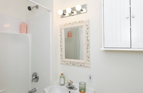 Courtenay House | Cozy hotel like bedroom suite with fridge, microwave, coffee and full piece bath