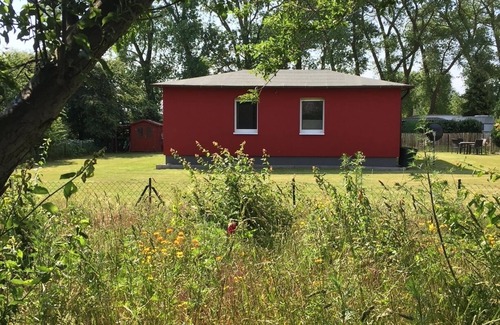 Ummanz House | Cozy "house on the dike" with a large garden invites you to relax