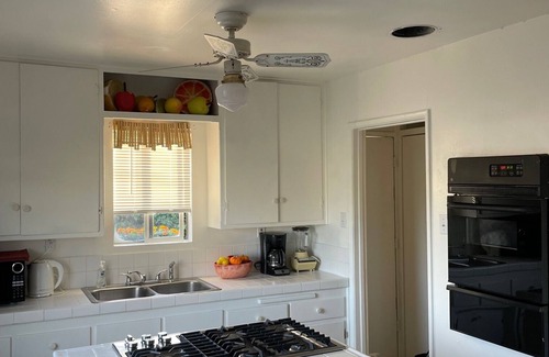 Grover Beach House | Cozy house with fireplace near beach, with spa surrounded by rustling bamboo.