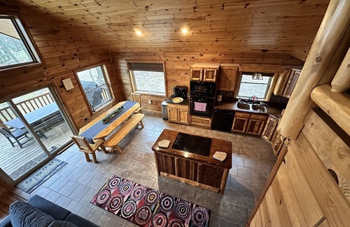 Hillman Cabin | Cozy lake-front home on crystal clear, all sports Long Lake in Hillman, MI.