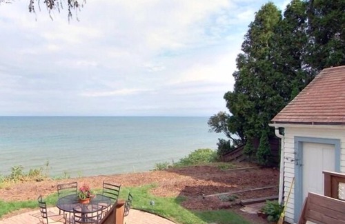 Sheboygan House | Cozy Lake Michigan Cottage Direct Lakefront Views of Lake Michigan Premier Host!