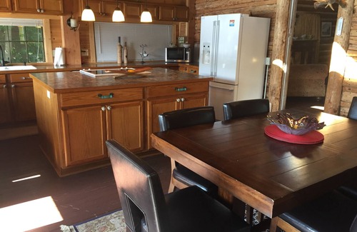 Rathdrum Cabin | Cozy Lakefront Cabin on Lower Twin Lake w/Private Dock & Beach