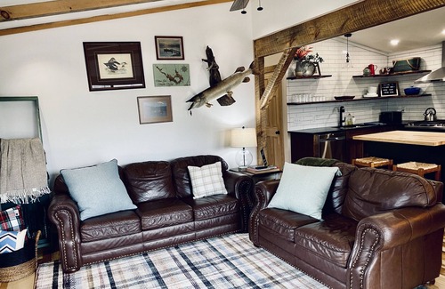 Hayward Cabin | Cozy Lakefront Cabin with Private Dock, Firepit, Grill, Kayaks and More!