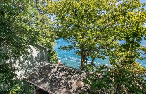 Town of Jerusalem House | Cozy Lakefront Cottage with Porches, Dock, and Lake Views