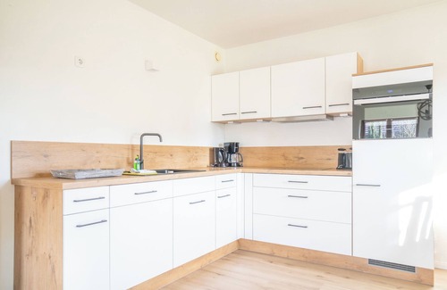 Born auf dem Darss House | Cozy living in the wooden cottage.