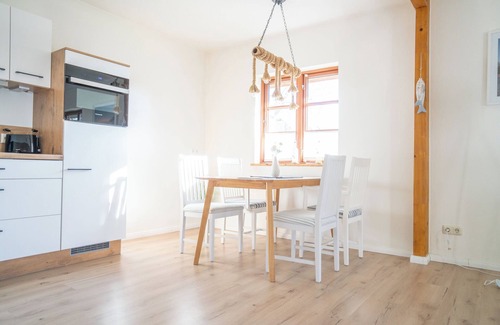 Born auf dem Darss House | Cozy living in the wooden cottage.