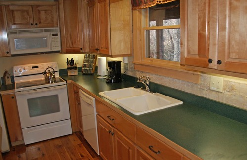 Seven Devils Cabin | Cozy log cabin available Thanksgiving and Christmas. Wood burning fireplace.