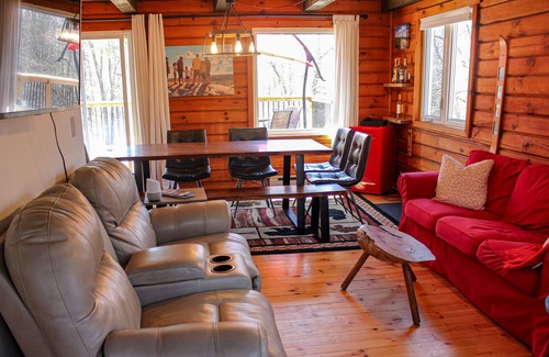 Greater Madawaska Ski Chalet | Cozy log cabin W/ Hot Tub, fire pit, trails nearby.