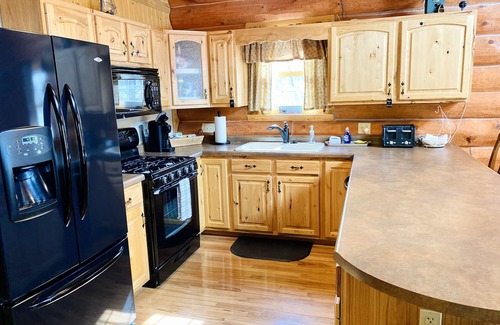 Rome Cabin | Cozy Log Cabin with fireplace, pool table, deck, and spacious kitchen!