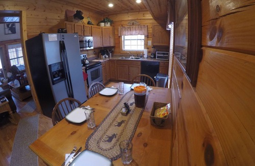 Gatlinburg - Pigeon Forge Cabin | Cozy Log Home, Centrally Located, 2 Master Suites, Hot Tub, Game and Movie Rooms