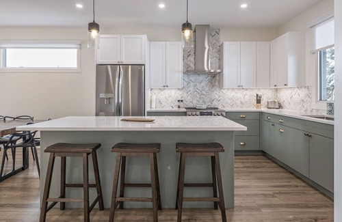 Silver Star Mountain House | Cozy modern duplex with hot tub, BBQ, garage, A/C, media room, large gear room