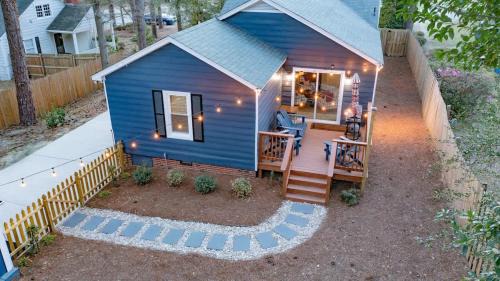 Terry Sanford House | Cozy Movie Room and King Size Bed