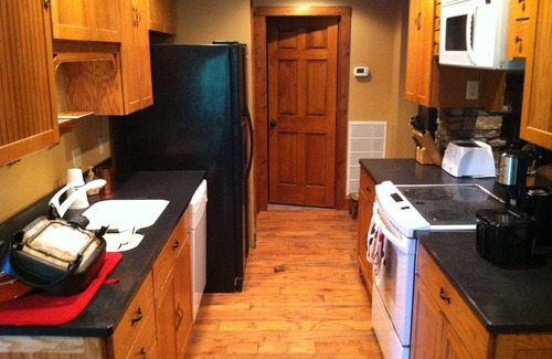 Tuckasegee Cabin | Cozy Mtn Lakefront Cabin on Wolf Lake w/Pontoon boat/Kayaks/Hot Tub/Firepit