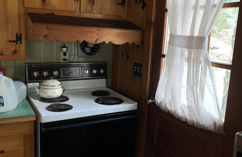 Kingfield Cabin | Cozy & Private: waterfront retreat on 20 acres of beautiful forest