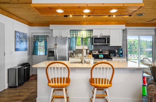 Traverse City Cottage | Cozy remodeled cottage directly on Bass Lake. Ten minutes to Traverse City.