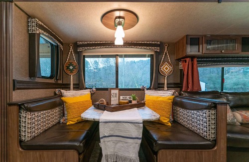 Tate House | Cozy retreat located on the bank of a rushing creek.