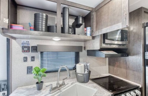 Tower District House | Cozy Retreat on Wheels: Charming RV Trailer