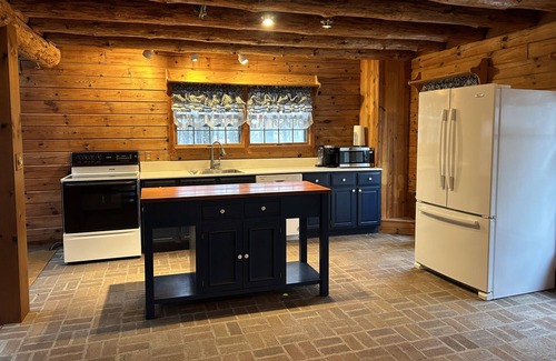 Elk Creek Township Cabin | Cozy retreat with jacuzzi and 12 acres of land to escape away too. Pet friendly
