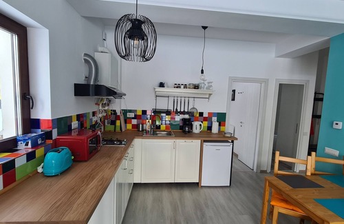 Busteni Apartment | Cozy Riverfront 2 with Garden and Mountain View