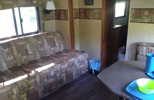 Black Creek House | Cozy RV nestled on a 31.9 acre property mins from Miracle Beach Provincial Park