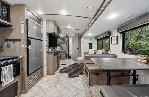 Bonney Lake House | Cozy RV on private wooded property w/ AC, WiFi, firepit, & close to amenities