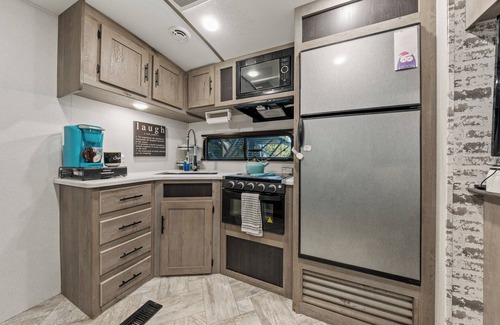 Bonney Lake House | Cozy RV on private wooded property w/ AC, WiFi, firepit, & close to amenities