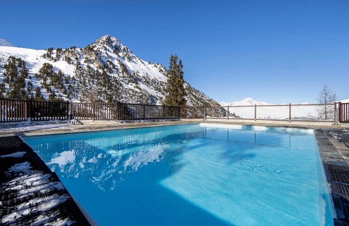 Arc-1950 Apartment | Cozy Ski-In/Ski-Out Apartment with Pool, Jacuzzi, and Stunning Mountain Views