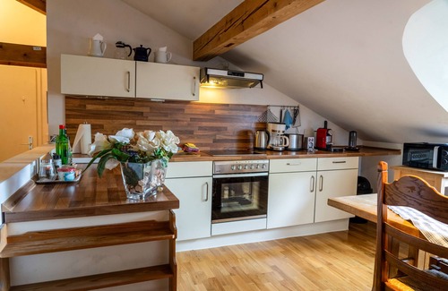 Munchen District Apartment | Cozy, spacious attic studio, only 24 KM from Munich center