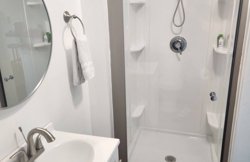 Manchester Apartment | Cozy street view studio apartment with fully equiped kitchenette and queen bed.