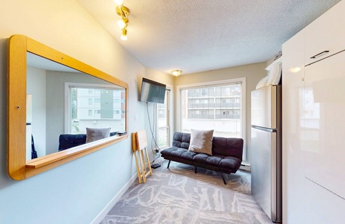 Big White Ski Resort Apartment | Cozy studio with kitchenette, WiFi, & shared seasonal hot tub - walk to lifts