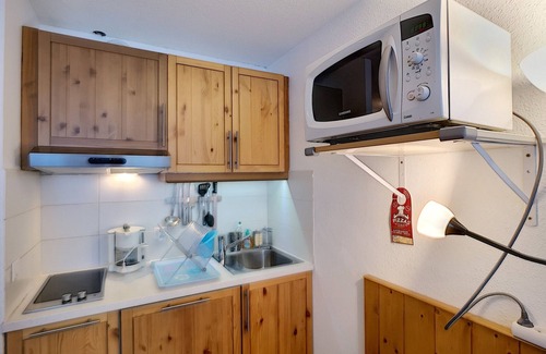 Les Menuires Apartment | Cozy studio for 2 at La Croisette, Les Menuires, with balcony and parking
