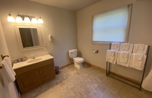 Stahlstown Hotel | Cozy suite with fireplace. Close to hiking trails, ski resorts and family parks!