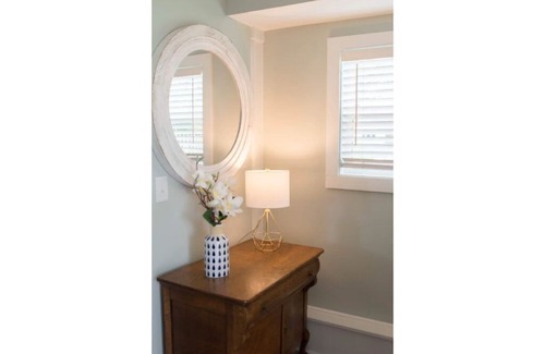 Harkers Island Resort | Cozy waterfront retreat with lighthouse view.