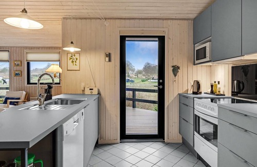 Langeland Municipality House | Cozy, well-equipped cottage with sauna and wood-burning stove.