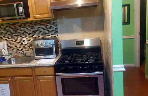 Queens House | Cozydelightful near UBS ARENA, JFK, LAGUARDIA AIRPORT.