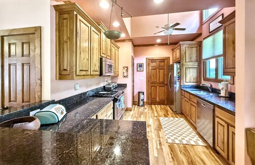 Highlands House | Creekside Cradle: A cozy 3-bedroom retreat in Highlands, NC with mountain and water views.