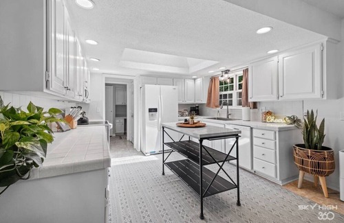 Rogers Cottage | Creekside Oasis - 5BR Retreat with Pool & Hot Tub