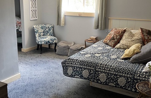 Houghton Lake House | Custom built in Queen day bed room. Stylish high end bedding & mattresses.