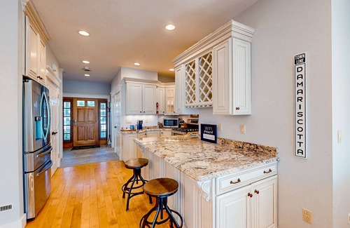 Edgecomb Condo | Custom riverfront townhome with amazing view, dock, boat slips & location