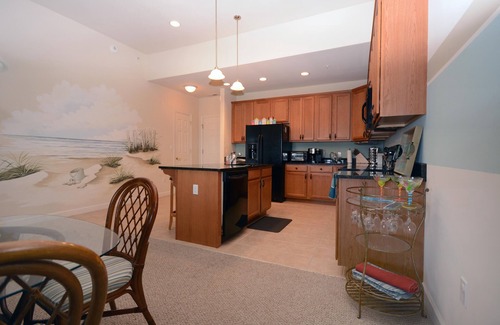 Ocean City Condo | Cute 2-bedroom condo with adorable coastal decor and free WiFi located downtown on the bayside and just two blocks to the beach and Boardwalk!