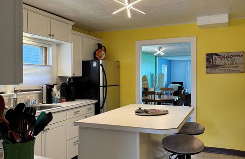 Bay City House | Cute house on Saginaw Bay with hot tub on private beach.