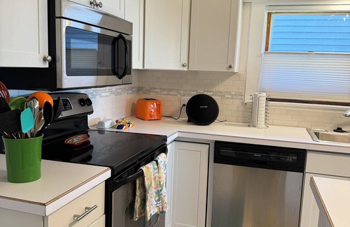Bay City House | Cute house on Saginaw Bay with hot tub on private beach.