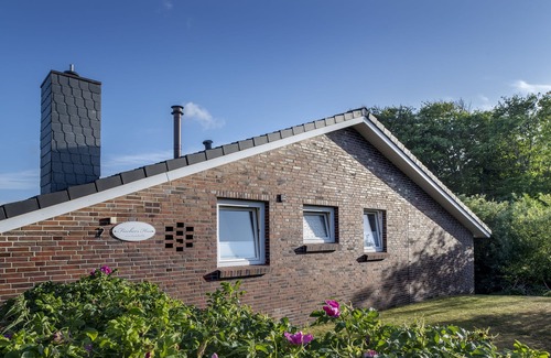 Langeoog House | Das Fischer's HUS Liegt Idyllisch im Grünen am Langeooger Ortsrand.