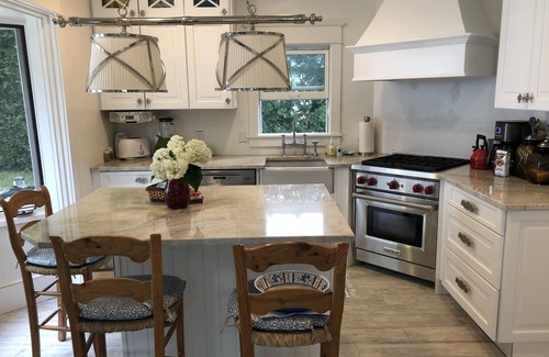Harbor Springs House | Daybreak Cottage Walk to Beach, Town and Yacht Club sit on the Front Porch