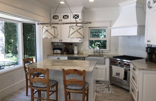 Harbor Springs House | Daybreak Cottage Walk to Beach, Town and Yacht Club sit on the Front Porch